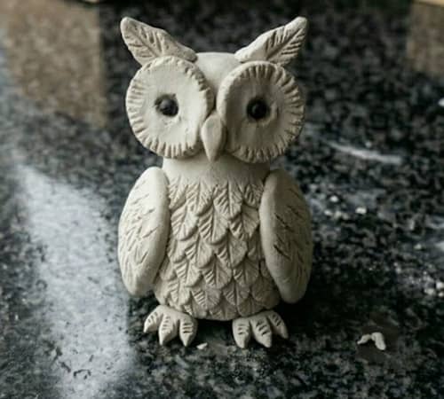 Step 6 - Add Ear Tufts And Tiny Feet