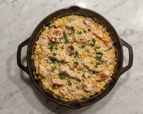 1. Creamy Garlic Chicken Rice Skillet with Sweet Corn