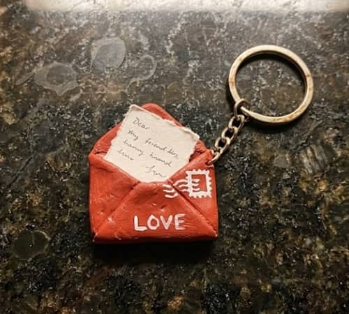 1. Tiny Secret Pocket Letter Keychain