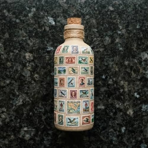 11. Vintage Postage Stamp Travel Bottle