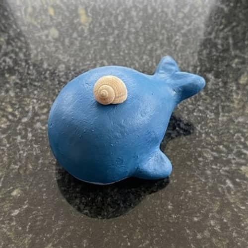 12. Chubby Whale Carrying a Tiny Shell