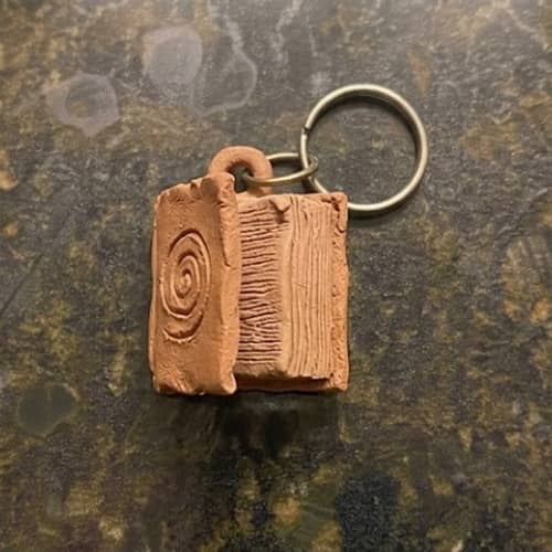 12. Tiny Book With Opening Cover Keychain