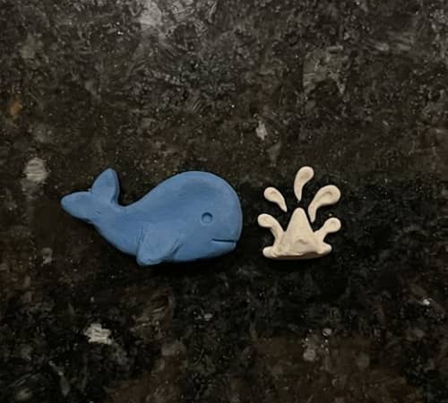 2. Pocket Lucky Whale With Tiny Water Splash
