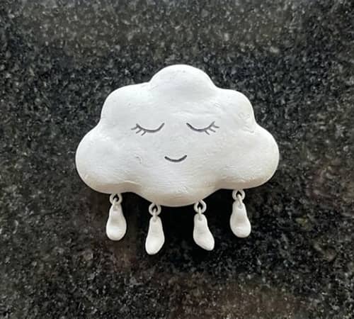 3. Tiny Sleepy Cloud with Dangling Legs