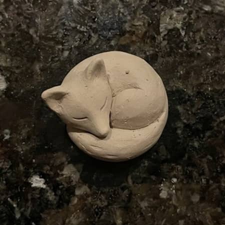 4. Tiny Sleeping Fox Curled Into a Circle
