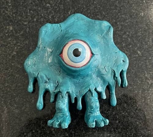 6. One-Eyed Paint Splatter Monster