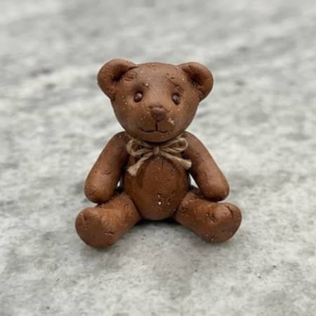1. Sleepy Miniature Teddy Bear