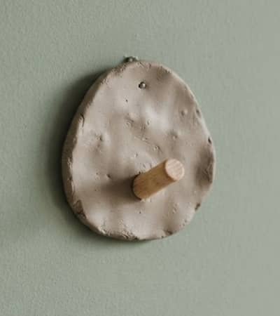2. Pebble Hook With a Hidden Wooden Peg