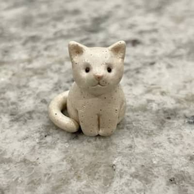 2. Tiny Sitting Cat