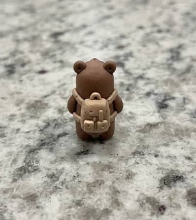 7. Tiny Clay Bear With Backpack