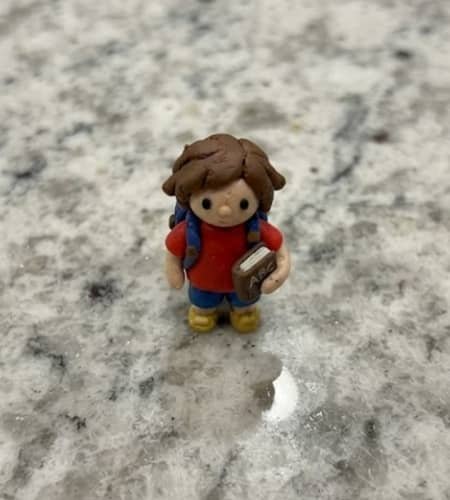 9. Little Clay Schoolchild