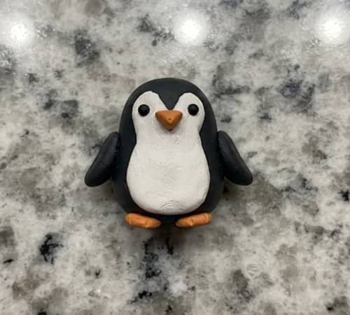 9. Mini Clay Penguin