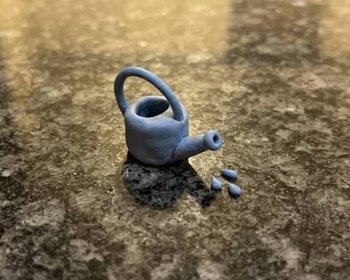9. Mini Clay Watering Can