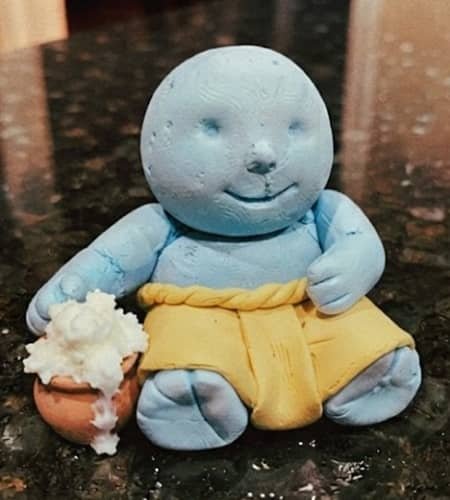 Step 4 - Dress Baby Krishna