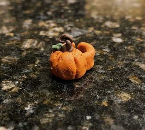 1. Tiny Pumpkin Ear Cuff