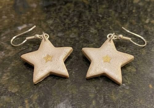 10. Metallic-Looking Star Earrings