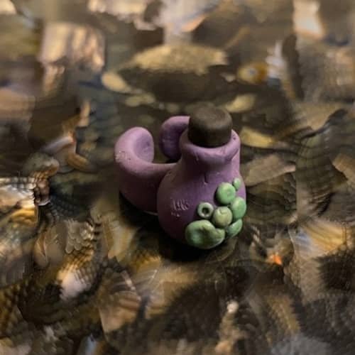 10. Poison Potion Bottle Cuff