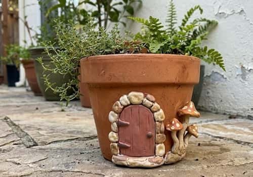 11. Clay Mushroom Doorway Pot