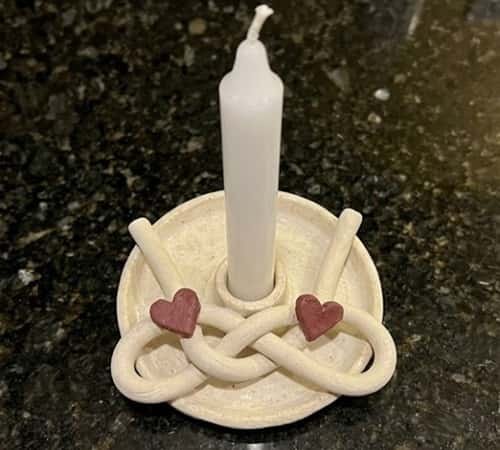 11. Love Knot Taper Candle Stand