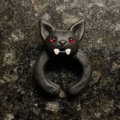 12. Cute Vampire Bat Fang Cuff
