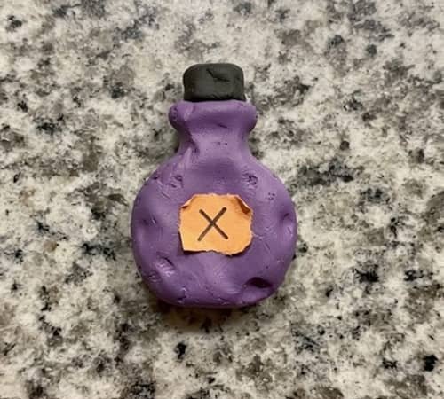 13. Halloween Potion Bottle Magnet