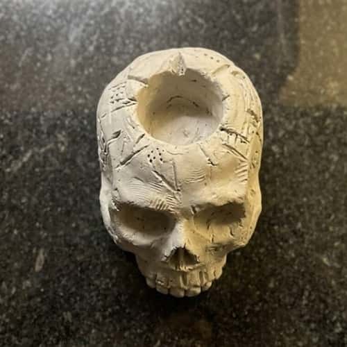 2. Skull Face Clay Candle Holder