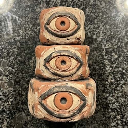 2. Three-Eyed Guardian Totem