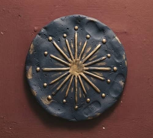 3. Clay Firework Burst Wall Medallion