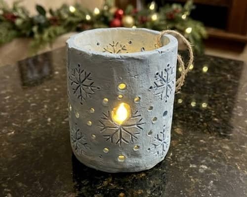 3. Snowflake Cutout Clay Lantern