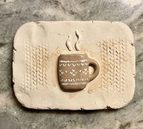 3. Tiny Clay Mug Cozy Plaque