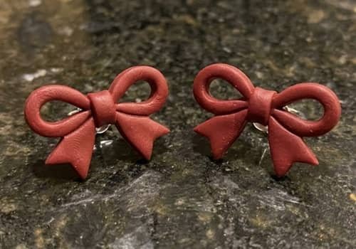 4. Minimalist Red Bow Earrings