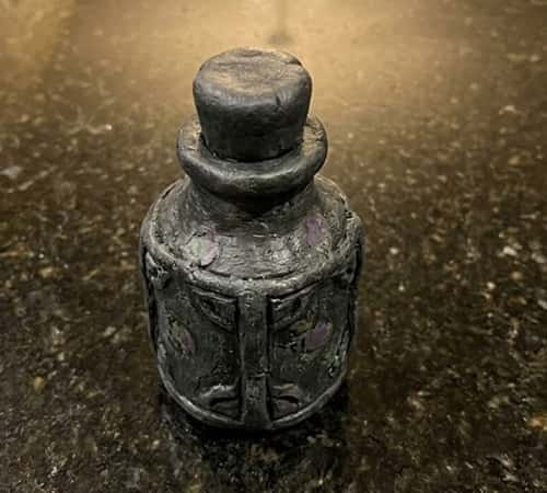 6. Gothic Potion Bottle Clay Sculpture