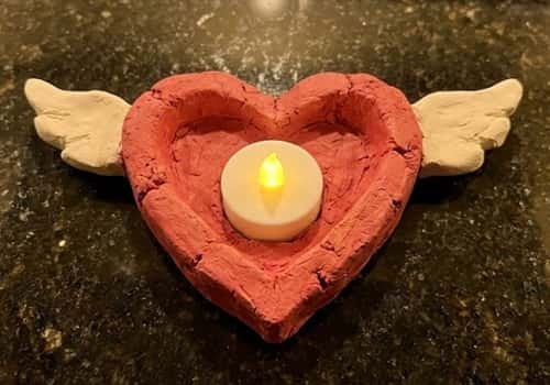 7. Clay Cupid Heart Holder