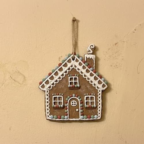 7. Clay Gingerbread House Wall Art