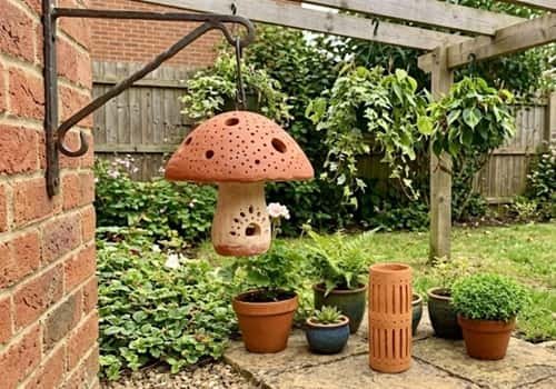7. Clay Mushroom Garden Lantern