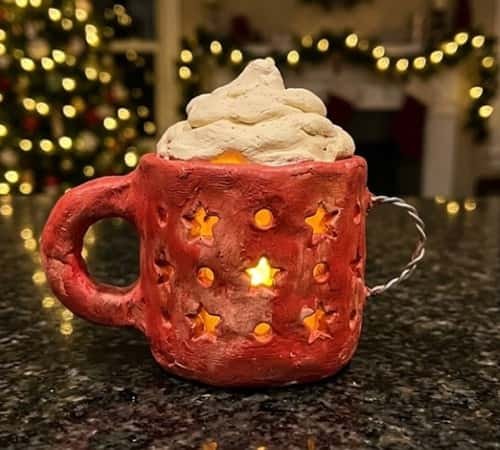 7. Elfs Hot Cocoa Mug Lantern