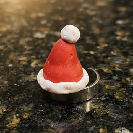 7. Santa Hat Ear Cuff
