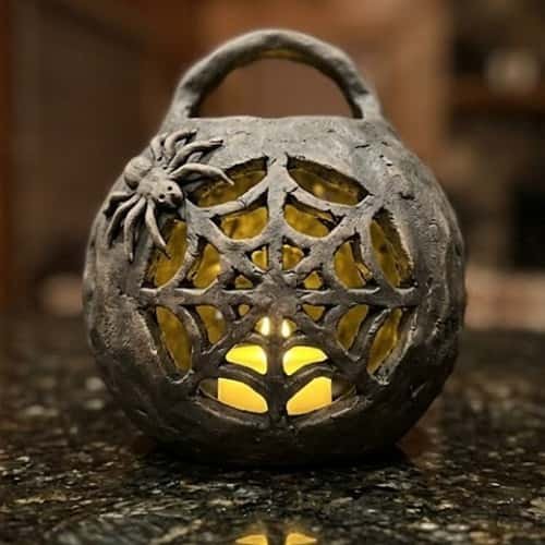 7. Spiderweb Clay Lantern