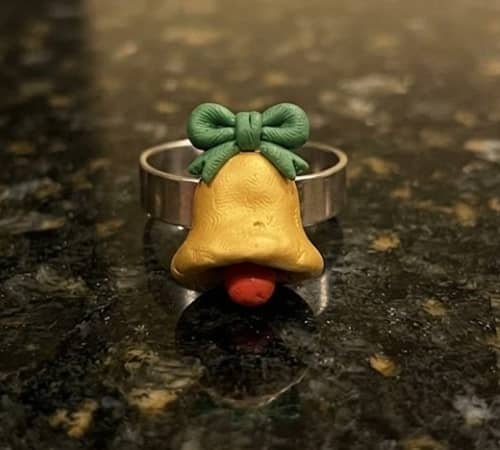 8. Christmas Bell Ear Cuff