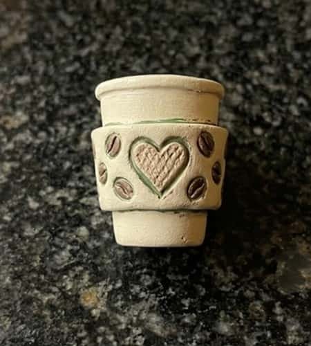 8. Clay Coffee Sleeve