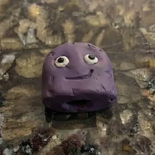 8. Purple Clay Pencil Topper