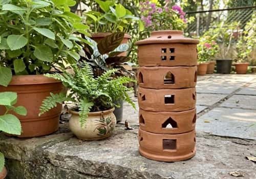 8. Stacked-Ring Clay Lantern