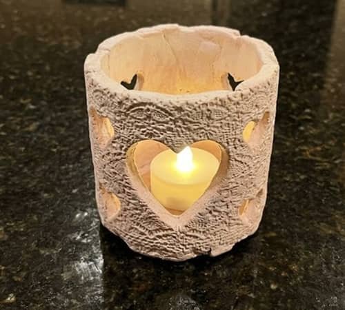 9. Lace-Pattern Clay Lantern