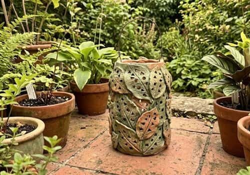 9. Leaf-Wrapped Garden Lantern
