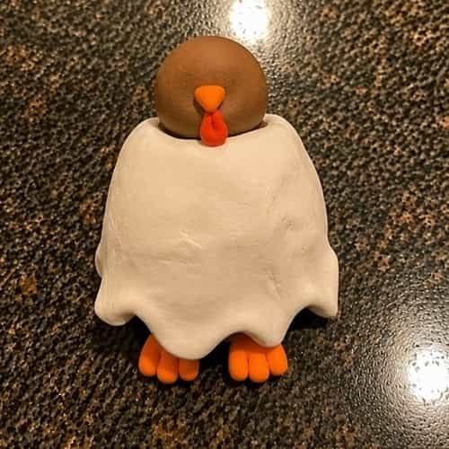 Step 4 - Cover the Turkey With the Ghost Costume