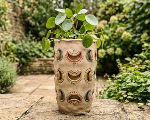 12. Half-Moon Cutout Boho Planter