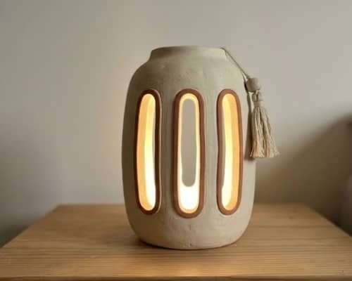 12. Minimal Boho Clay Lamp With Tassel Detail