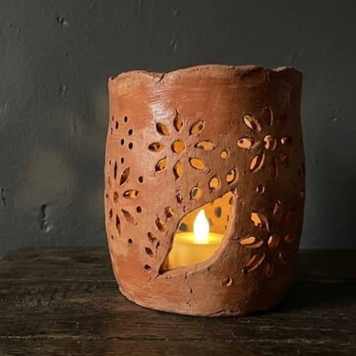 2. Floral Pierced Clay Lantern