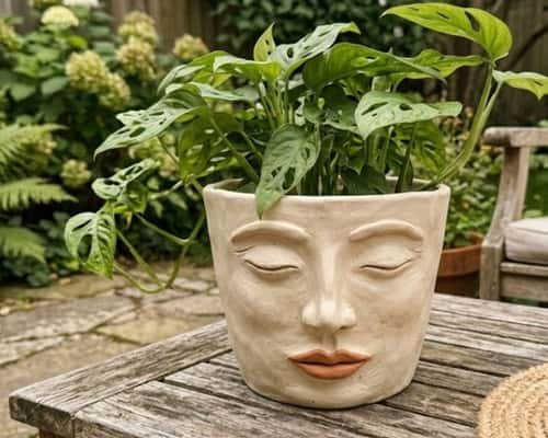 3. Boho Face Clay Flower Pot