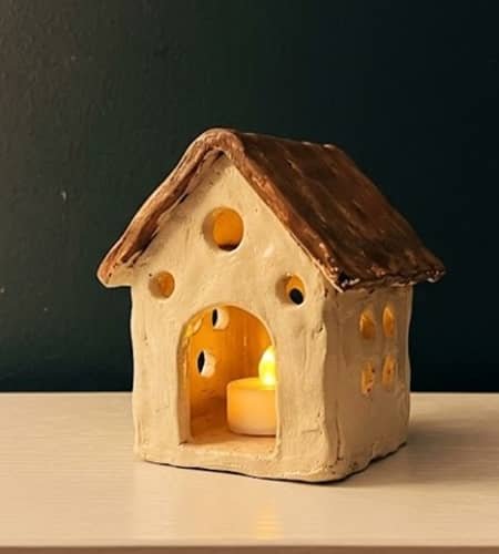 3. Tiny Clay Lantern For A Bedside Shelf